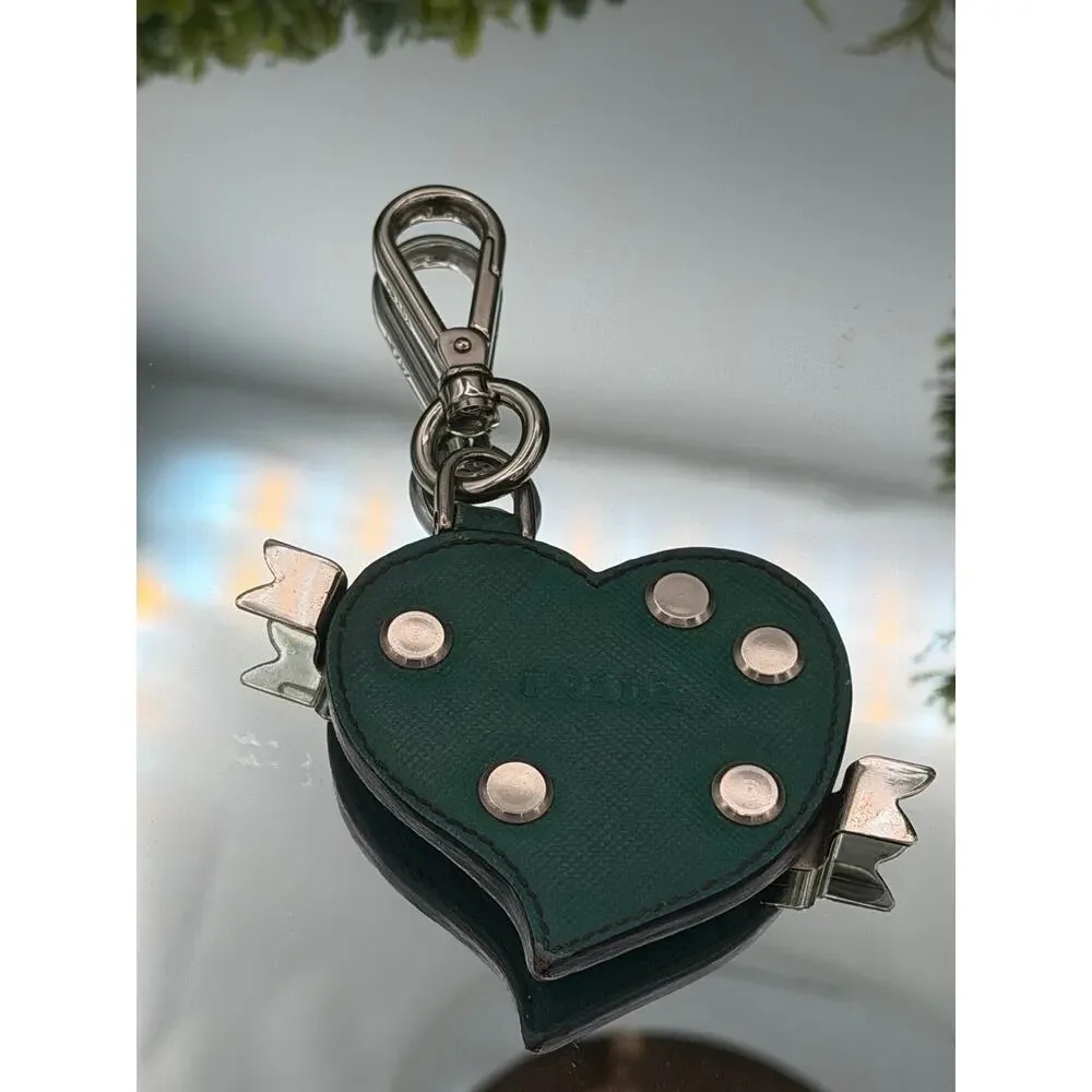 Prada studded heart keychain made of green saffiano leather